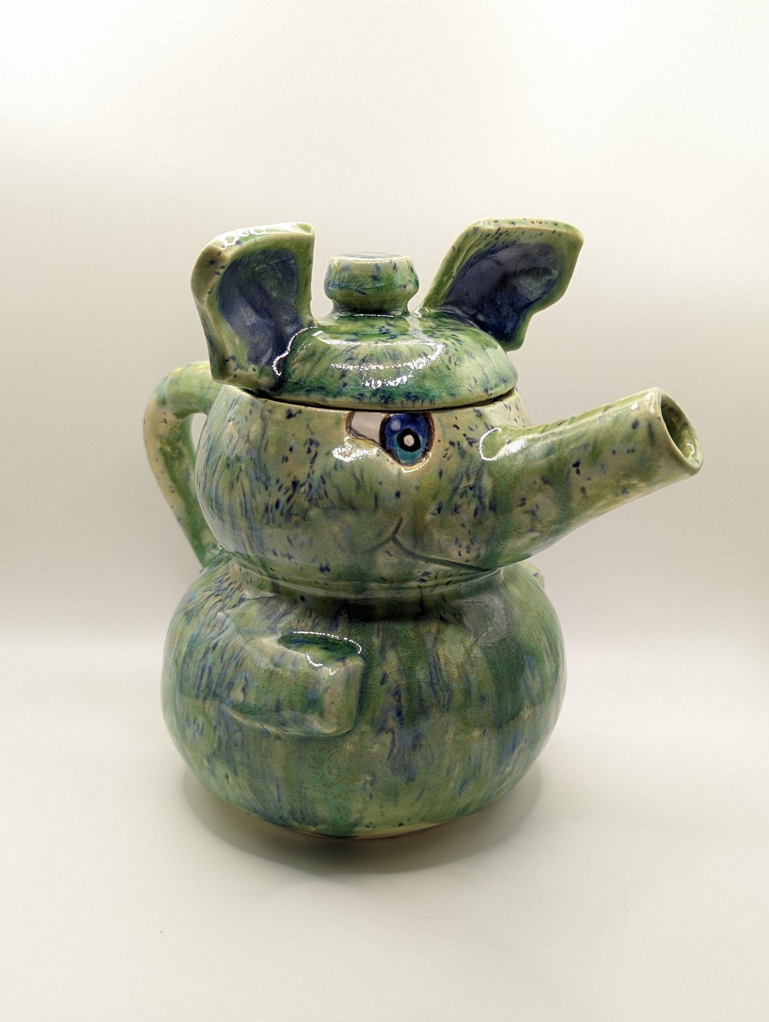 blue elephant ceramic teapot cartoony